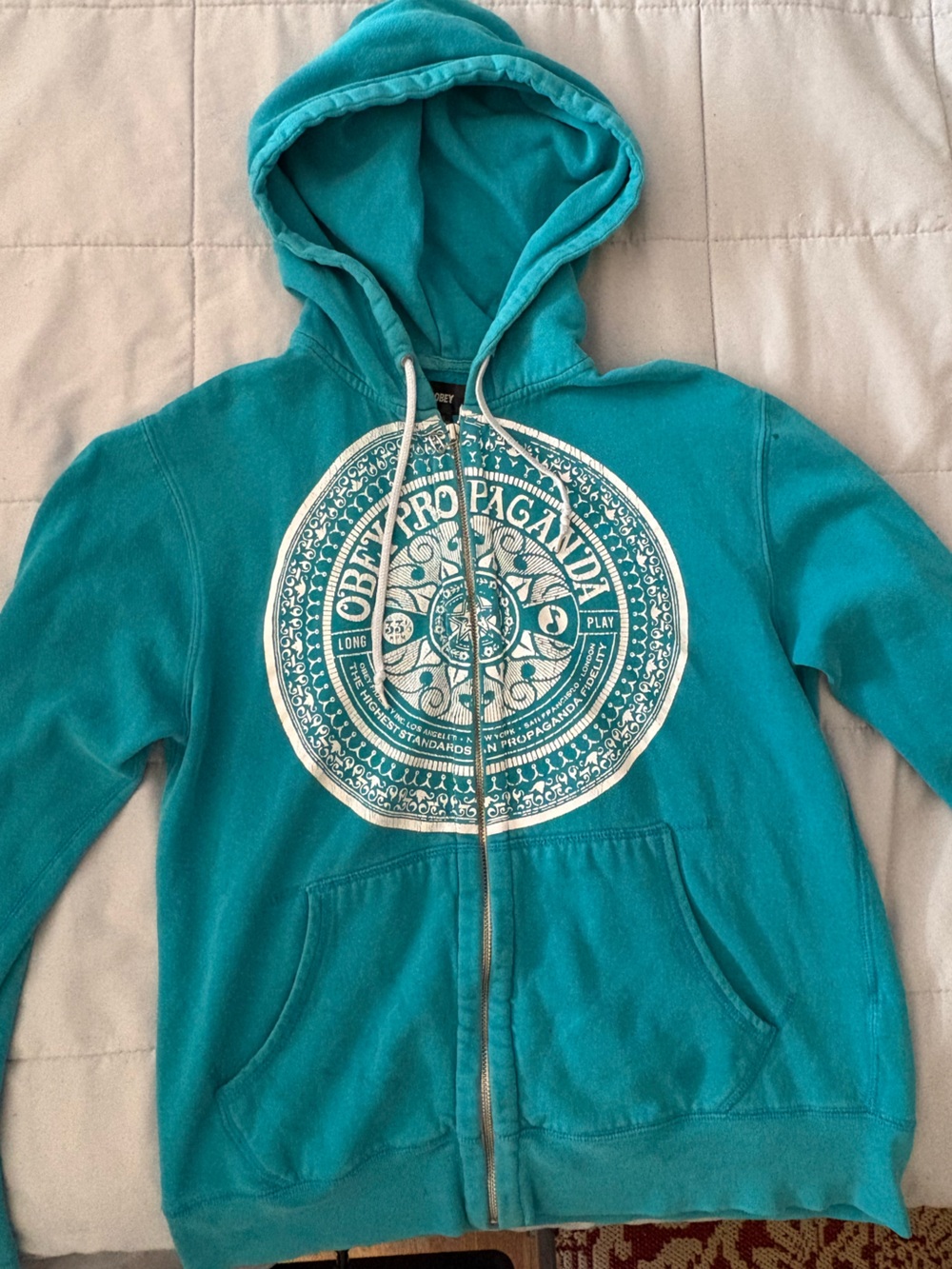 Obey Teal Zip-Up Hoodie with White Circular Graphic